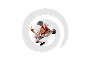 Top view. Wrestlers in action, two male athletes wrestling, training isolated on white background