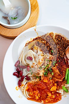 xi an biangbiang noodles with mutton entrails soup at vertical composition photo