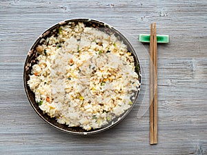 Top view of yangzhou fried rice in ceramic plate