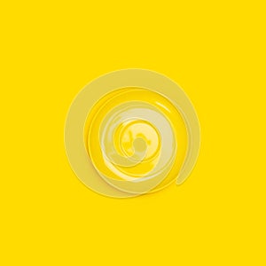 Top view of yellow ceramic plate saucer on yellow background