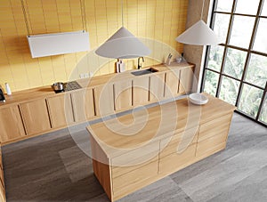 Top view of home kitchen interior with bar island, cooking cabinet and window