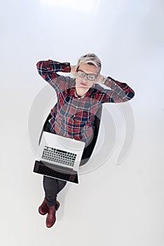 Top view of young business woman working on laptop computer