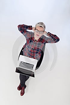 Top view of young business woman working on laptop computer