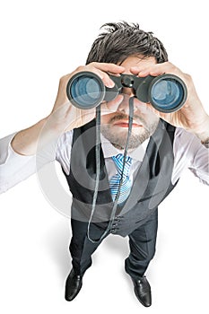 Top view on young man looking in binocular towards you. on white.