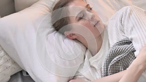 Top View of Young Woman Waking Up in Shock, Nightmare