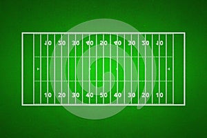 Top views of american football field. Green grass pattern for sport background. Ragby football field with white lines marking the