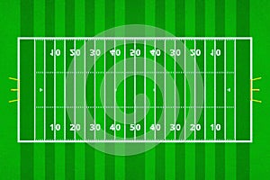 Top views of american football field. Green grass pattern for sport background. Ragby football field with white lines marking the