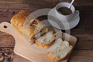 Top views of Bread stuffing with pork on wooden background