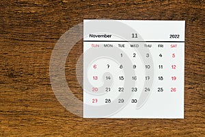 Top views Calendar desk November is the month for organizers to plan and remind on the wooden table background