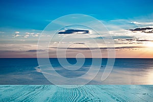 Top of wood table with summer seascape and white cloud blue sky in nature vacation background