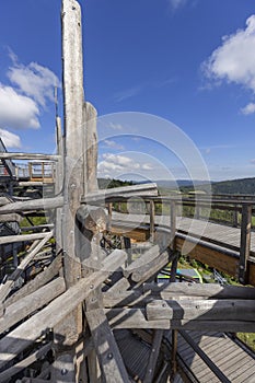 Top of wooden observation tower located at the top of the Slotwiny Arena ski station, leading in the treetops, Krynica Zdroj,