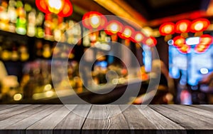 Top of Wooden table with Blurred Bar Interior Chinese new year restoran background.