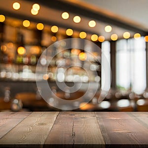 Top of Wooden table with Blurred Bar Interior restaurant background.