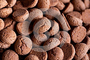 A topdown tasty portrait of a lot of delicious traditional dutch snacks called pepernoten or pepernuts. The gingerbread treat is a