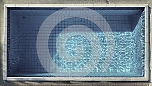 Topdown view of a small, rectangular swimming pool