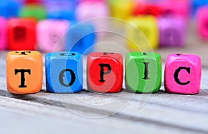 Topic word on table photo