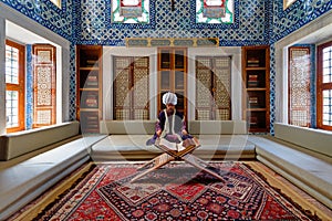 Topkapi palace reading room interior with Koran Istanbul Turkey