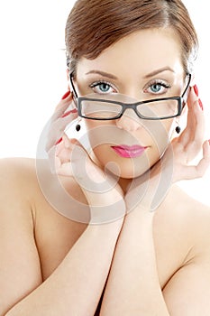 Topless lady in black plastic eyeglasses