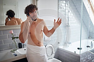 Topless man fighting while brushing