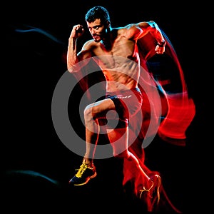 Topless muscular man runner. running jogger jogging isolated black background