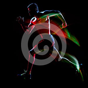 Topless muscular man runner. running jogger jogging isolated black background