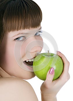 Topless woman with green apple