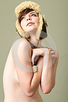 topless woman wearing hat