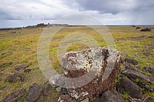 A toppled moai along the southern coast of Easter Island, Chile