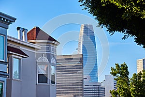 Tops of buildings in San Francisco facing toward distant Salesforce Tower office building
