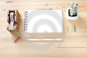 Topview of office stuff on wooden working table