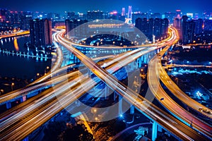 topview urban motion expressway highway, traffic junction trails on the bridges, long exposure photo