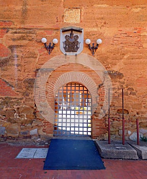 ancient palace entrance in Guzmanes palace photo