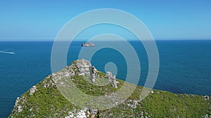 Torbay, South Devon, England: DRONE VIEW: A speedboat passes heads towards Thatcher Rock photo