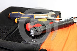 Torch and screwdriver