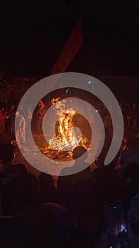 torch war performance, people around the fire in Jepara, Central Java