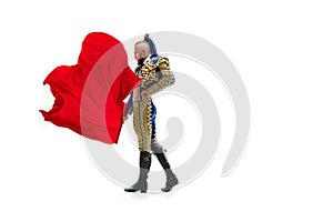 Torero in blue and gold suit or typical spanish bullfighter isolated over white