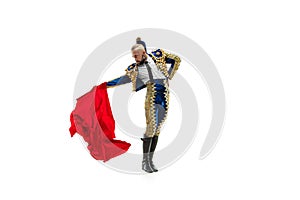 Torero in blue and gold suit or typical spanish bullfighter isolated over white