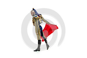 Torero in blue and gold suit or typical spanish bullfighter isolated over white