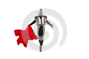 Torero in blue and gold suit or typical spanish bullfighter isolated over white