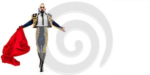 Torero in blue and gold suit or typical spanish bullfighter isolated over white photo