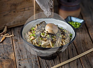 Tori UDON served in a bowl isolated on wooden background side view of japanese food