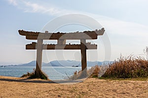 Torii gate in front of the sea