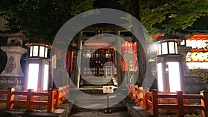 Torii Gate and Illuminated Stone Lanterns at yasaka Shrine
