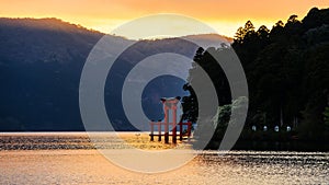 torii gate at Lake Ashi during sunset