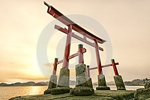 Torii gate of a shrine and sea