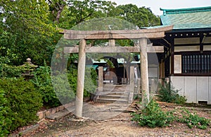 The torii gate to the Shiratama Shrine. Osaka Castle. Osaka. Japan