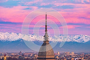 Torino Turin, Italy: cityscape at sunrise with details of the Mole Antonelliana towering over the city. Scenic colorful light on