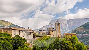 Torla Ordesa, church with the mountains at bottom, Pyrenees Spain