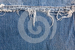 Torn Blue Denim Background