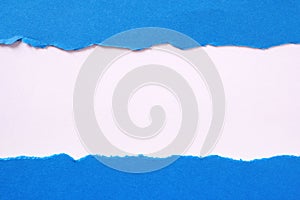 Torn blue paper strip straight edge border flat white